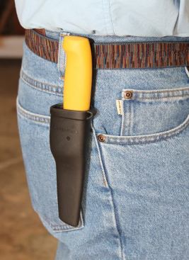When you’re wearing regular clothes you can snap the sheath over your belt, though it’s really much more convenient to hang it from a metal button on your vest or pant leg. This sheath holds one knife but Hultafors also makes a double with space for one knife next to another.