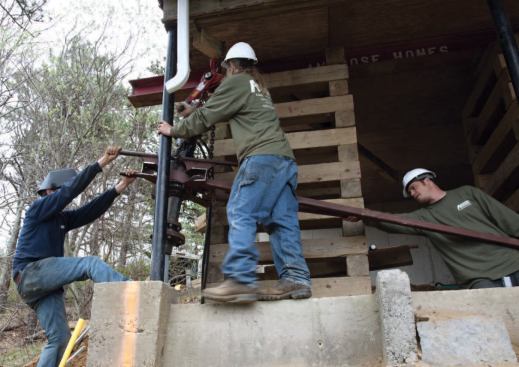 As the required driving force increased, a drag bar attached to the auger frame helped counter the reverse torque.