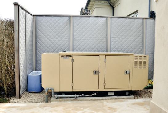 The noice reduction is achieved even though clearances between the generator and enclosure are limited because of the existing landscape design and zoning constraints.