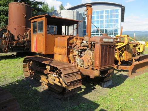 This TA series McCormick-Deering tractor was built by International Harvester in the early 1930s. The cab is shaped like one from an old locomotive.