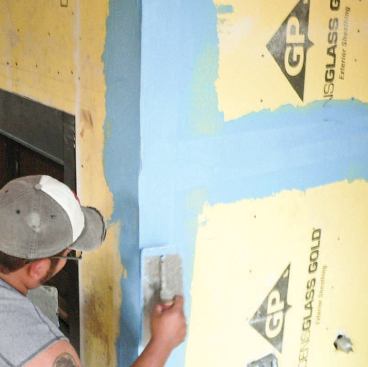 Once the joints are treated, the entire surface will be skim-coated with the membrane.