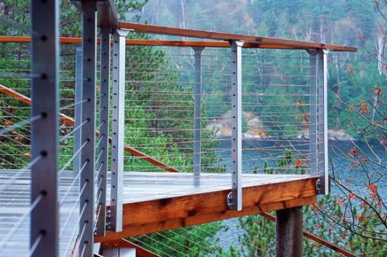 Most cable is 316-grade stainless steel, with common diameters at 1/8, 5/32, 3/16, and &frac14; in. The &frac14; inch used mostly for commercial work. "The price for [1/4 inch] jumps pretty substantially," says Mark Ellis of Creative Redwood Designs, a deck builder in Los Gatos, Calif. All cable comes with a listed "strand profile," which indicates how many strands of wire there are in how many groups. A 1x19 profile means there is one group of 19 strands, while a 7x7 cable has 7 groups, each with 7 strands. The strand profile affects the cable's strength and flexibility: the 1x19, the more expensive type, is stronger and stiffer, and the best choice for long, straight runs. The 7x7 is more flexible and suited to shorter lengths.