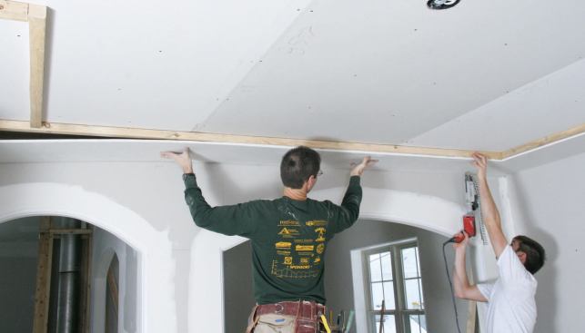I install 2x2 furring screwed through the drywall into the framing and fasten scrap drywall to the furring.