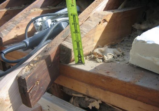 The original 2x4 rafters left little space for insulation at the eaves.