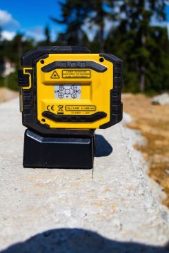 A base, which Stabila refers to as a "framing base" screws to the bottom of the unit, rasing it up so that the lower plumb dot line is visible. The laser is more stable and less likely to tip with this base than it is with the built-in adjustable height "foot". Uhler and his crew found that the adjustable foot made the unit top heavy and more prone to tipping.
