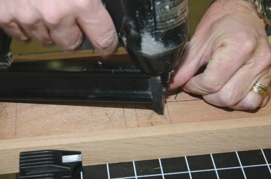 The oak rails are pinned from the back.