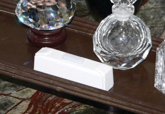 Pump controllers include simple wireless switches, like this one installed on a vanity top.