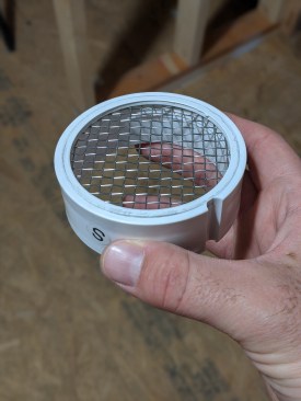 The final steps address two concerns: vermin and water entering the exhaust pipe. To combat vermin, the author uses a PVC mesh insert , which he buys online for around $9.