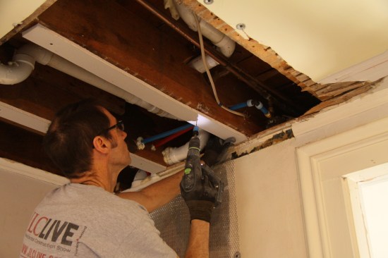 The plaster and lath was about one inch thick, so I padded out the ceiling joists with strips of 1/2-inch drywall.