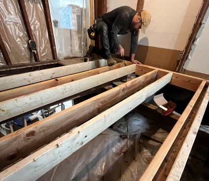 The main house floor structure needed to be reinforced with sister joists.