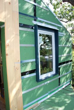 Place­tailor trims the window out with a simple custom trim package.