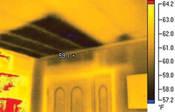 Uninsulated exterior walls, which the homeowner knew about, and an area of missing fiberglass batts in the ceiling that he did not know about.