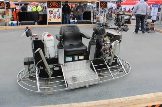A ride-on power trowel—as these things go this one is pretty small. I'll have to make a point of riding one at next year's show.
Click here for video of a power-trowel obstacle course race.