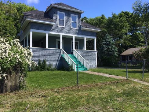 Before: A classic island vacation home, the existing house had light framing, no insulation, and deteriorated finishes inside and out. New owner Will Crosby bought the building at a foreclosure auction, and a Boston architect advised him to tear the building down (or at least rip off the entire second story). Instead, Crosby hired a local architect and builder to carry out a complete gut-rehab, including an above-code energy retrofit.