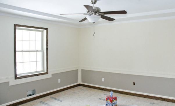 In this example, each wall section is framed with one panel. I did it that way because the spacing of the electrical boxes and heating ducts made it impossible to divide the walls into the evenly spaced panels you’d see with a traditional wainscot design.