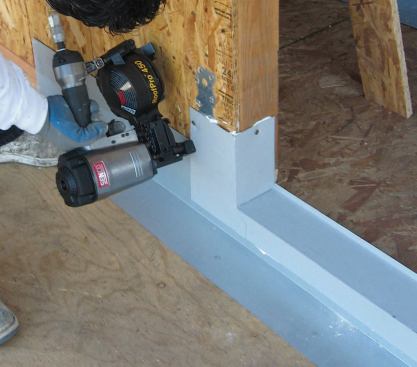 The first piece is installed in the opening and nailed to the trimmers.