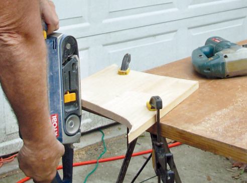 Make the Wood Router Template: I leave just a little bit of the line, then sand the cut smooth to the line with a belt sander.