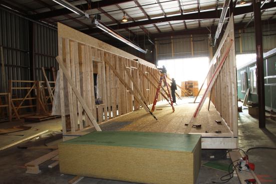 A modular unit frame sits in VerMod's Wilder, Vermont, factory bay on a freezing February day. Units take about a month to construct, according to VerMod founder Steve Davis.