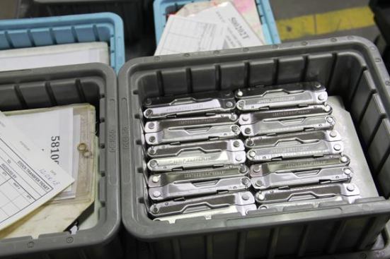 This bin contains finished Leatherman “Rebar” model multi-tools.