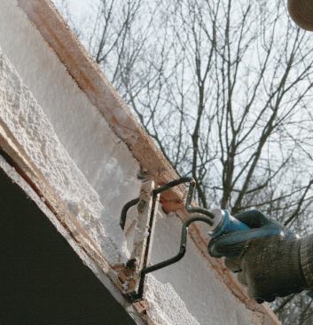 After the opening is made, the crew uses a "hot knife" to create a recess for 2x10 framing around the edges.