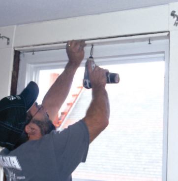 Reapplying the stops as the foam cures saves me a step because I don't have to shave off the excess foam. I start with the top, then do the sides, often springing them into place to get a snug fit.