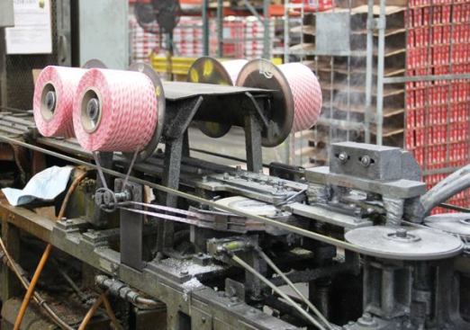 Finish carpenters will recognize the rolls of material being used to collate the finish nails shown in the previous photo.