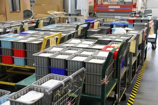 The bins on these carts contain various finished tools that will be shipped to a nearby Leatherman plant for packaging. From there the tools will be shipped to distributors and vendors.