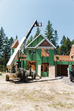 We often frame a gable in which a section of the floor plan extends through the plane of the main gable. If the ceiling in the smaller room is vaulted, we frame the smaller wall first and lift it into place, then we snap out and frame the larger wall with a hole in it that matches the profile of the smaller wall.