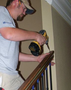 I reattach the handrail to the wall with long trim screws.