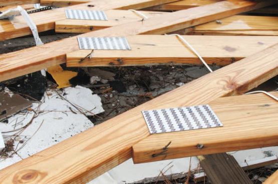 The home's roof trusses had been attached with toenails.
