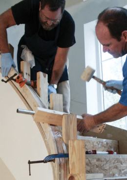 Deep-throated C-clamps are needed to clamp the bottom of the rail to the forms.