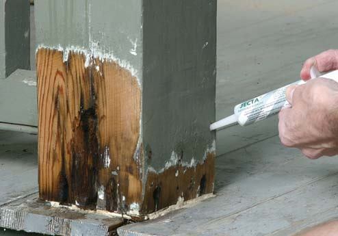 To quickly attack deeply buried rot, a borate gel is injected into a few small holes that have been drilled into the center of the wood.