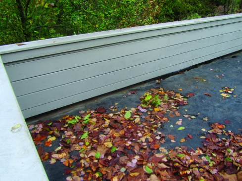 Because there is no complicated scupper flashing, parapet walls on posts are easier to detail.
