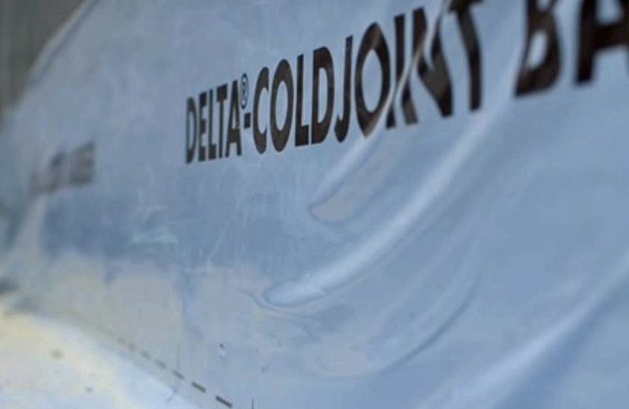 ColdJoint Barrier is applied to the horizontal ledge of the footing and up the wall for about a foot.