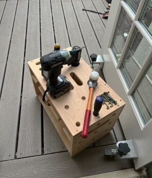 The portable cordless case doubles as a step stool and task oriented workstand. 