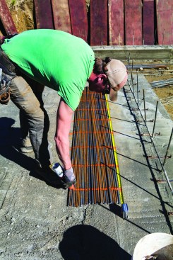 The position of the horizontal runs was spray-painted on the rebar that would be used for the verticals ...