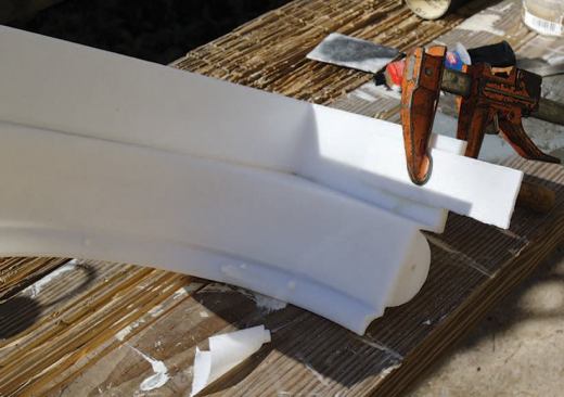 A pair of splice plates glued to the split PVC base with a quicksetting two-part epoxy helped us align the two halves.