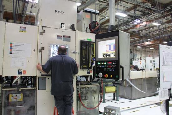 This computer-controlled punch press is more typical of what one sees in Leatherman’s highly mechanized plant. Still, the assembly work is done by hand because robots are simply not up to doing it.