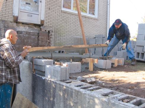 Rebuilding masonry steps with CMUs over a reinforced slab