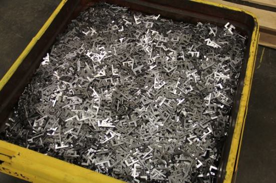 Steel parts—fresh from the stamping press in the previous photo.