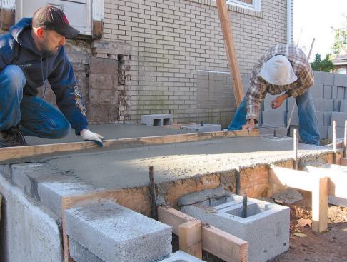 We left the slabs a little rough to help key the mortar and blockwork.