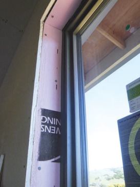 The units were surrounded with a thermal break of rigid foam. Later, the drywall was returned into the opening and finished with corner bead.