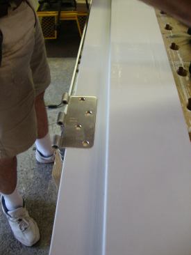 For some projects Greg uses heavy duty hinges with round corners that fit into place without modifying the mortise.