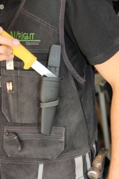 And slips through a loop directly below to prevent it from flopping around. I’ve had the vest for a while and am not sure if the current model has this feature – I don’t see it in the current catalog. No matter; I often wear European-style work pants and they still have the rivets.