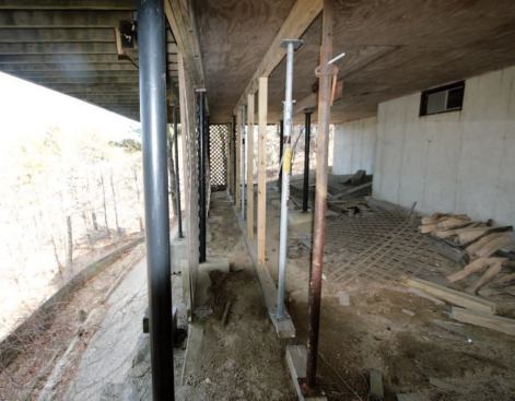 A hodgepodge of crude shoring did nothing to arrest the process.