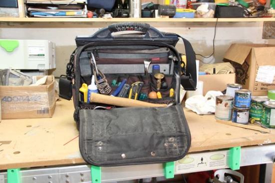 I carry my everyday tools in Pro-Pak bag. It’s pricey, but tough and reliable. The small size of this bag forces me to be organized even though I just throw tools in at the end of the day. The slim profile takes up little space in the back of my vehicle and the shoulder strap allows me to sling it so I can free up a hand, which means fewer trips when loading and unloading.