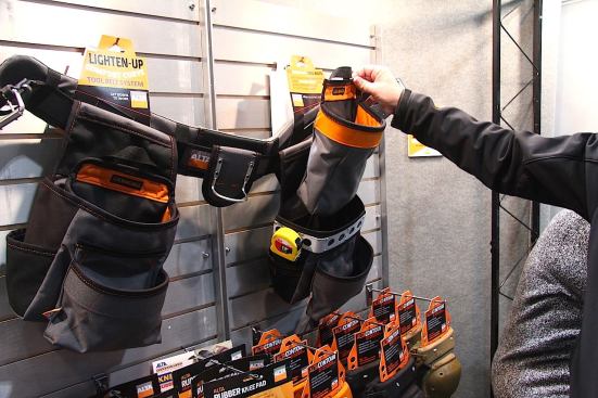 Alta Industries, known for their knee protection and other construction-related gear (AltaGEAR), displayed a prototype tool belt system that is lightweight, has an aluminum band around one of the pouches for clipping tools to, and holds removable bags.