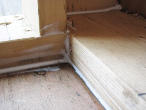 Leaving little to chance, the crew caulked all seams between framing members and subfloor.