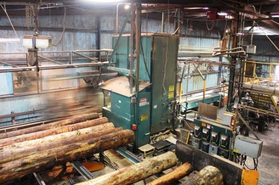 This is the pony rig (
video here), the smaller of the two band saws in the mill (the other is called the head rig—
video here) Sitting at controls inside the cab the sawyer (
video here) feeds logs onto the rig, rolls them into the desired position, and then cuts them in the manner of his choosing. It’s an important job and requires experience and judgment to get the highest yield—not just in board feet, but in value—out of each log.