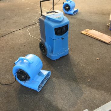 Commercial grade fans and dehumidifiers are the key to drying success.